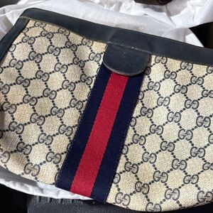 Gucci Beige Monogram Clutch with Red and Blue Accent cosmetics pouch